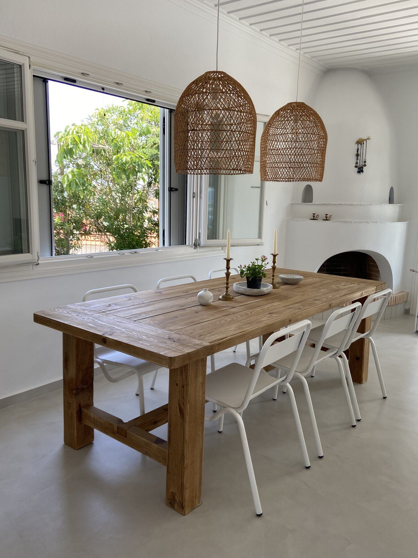 The dining end of the room and the open fireplace
